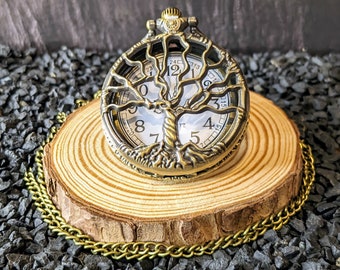 Reloj de bolsillo árbol de la vida de latón.