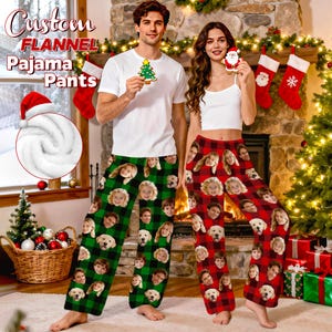 May include: Custom flannel pajama pants in green and red plaid patterns, personalized with faces. The image shows a couple wearing the pants, with a Christmas tree and fireplace in the background.