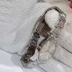 Reloj vintage de regalo para hombre Seiko Sportsmatic Deluxe 7619 Reloj automático 25 joyas Fondo de caja Dolphin imagen 9