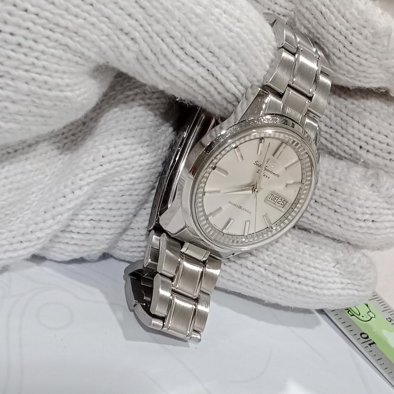 Reloj vintage de regalo para hombre Seiko Sportsmatic Deluxe 7619 Reloj automático 25 joyas Fondo de caja Dolphin imagen 8