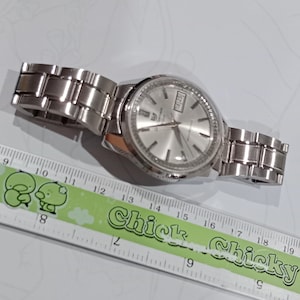 Reloj vintage de regalo para hombre Seiko Sportsmatic Deluxe 7619 Reloj automático 25 joyas Fondo de caja Dolphin imagen 5
