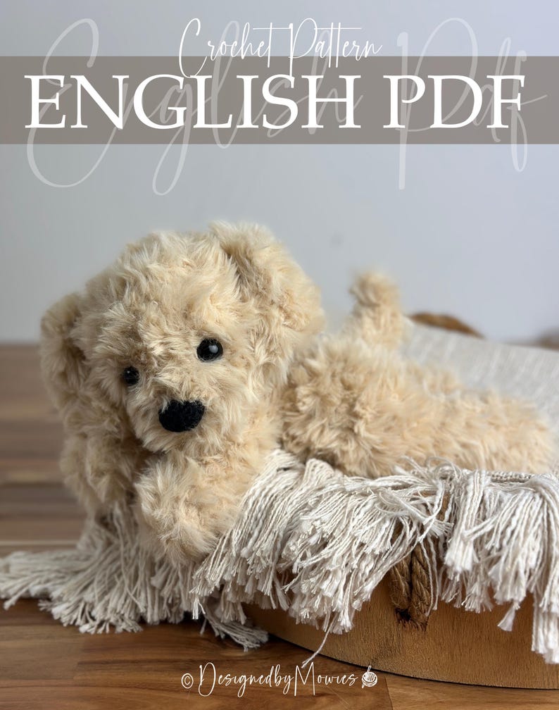 May include: A plush, beige crocheted puppy toy with a black nose and eyes, lying on a fringed blanket. The image includes the text "Crochet Pattern ENGLISH PDF" and the designer's name.