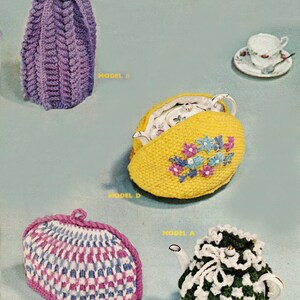 May include: Four crocheted teapot cozies in different colors and patterns. Model A is green and white striped with a white ruffle. Model B is purple with a yellow and pink beaded top. Model C is pink, white, and blue checkered. Model D is yellow with embroidered flowers.