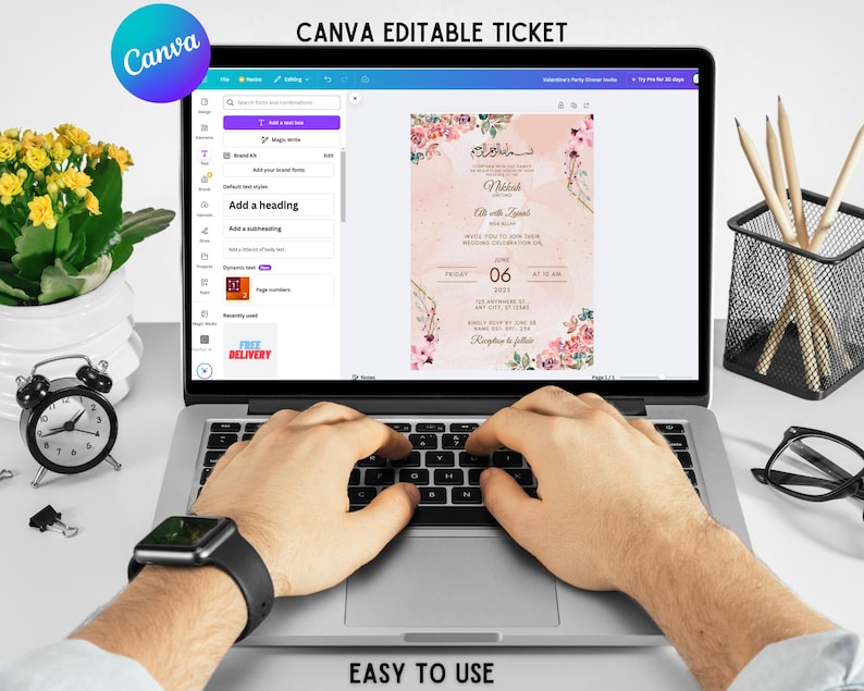 May include: A laptop computer screen displaying a Canva template for an editable ticket. The ticket is pink with floral designs and the text "Invitation Party Dinner India" and "06 2025". The laptop is on a white surface with a pair of glasses, a pencil holder, and a clock.