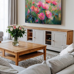 Samsung Frame TV displaying the spring wildflowers art, seamlessly blending digital artwork with home decor, creating a stunning centerpiece that enhances the aesthetic of any room.
