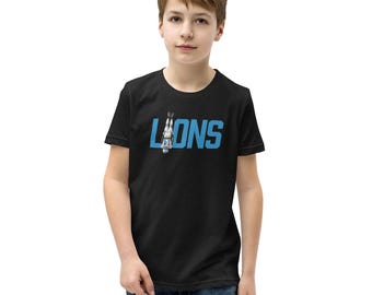 Camiseta juvenil de los Lions St. Brown