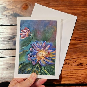Tarjeta de arte en blanco con flores vibrantes hecha de una pintura acrílica para todas las ocasiones, el Día de la Madre, una tarjeta romántica de San Valentín o una tarjeta de agradecimiento.