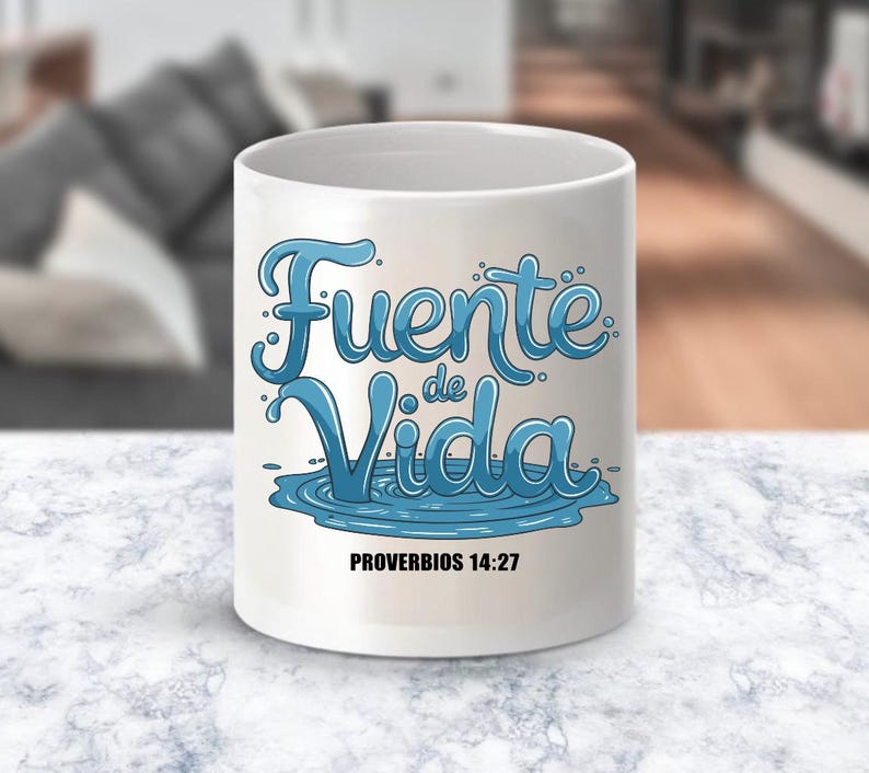 May include: White ceramic mug with a blue and white design that says "Fuente de Vida" and "Proverbios 14:27".