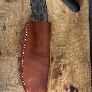 Sharp finger style skinning knife bild 1