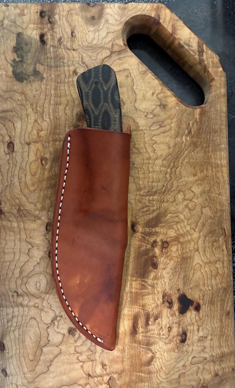 Sharp finger style skinning knife bild 1