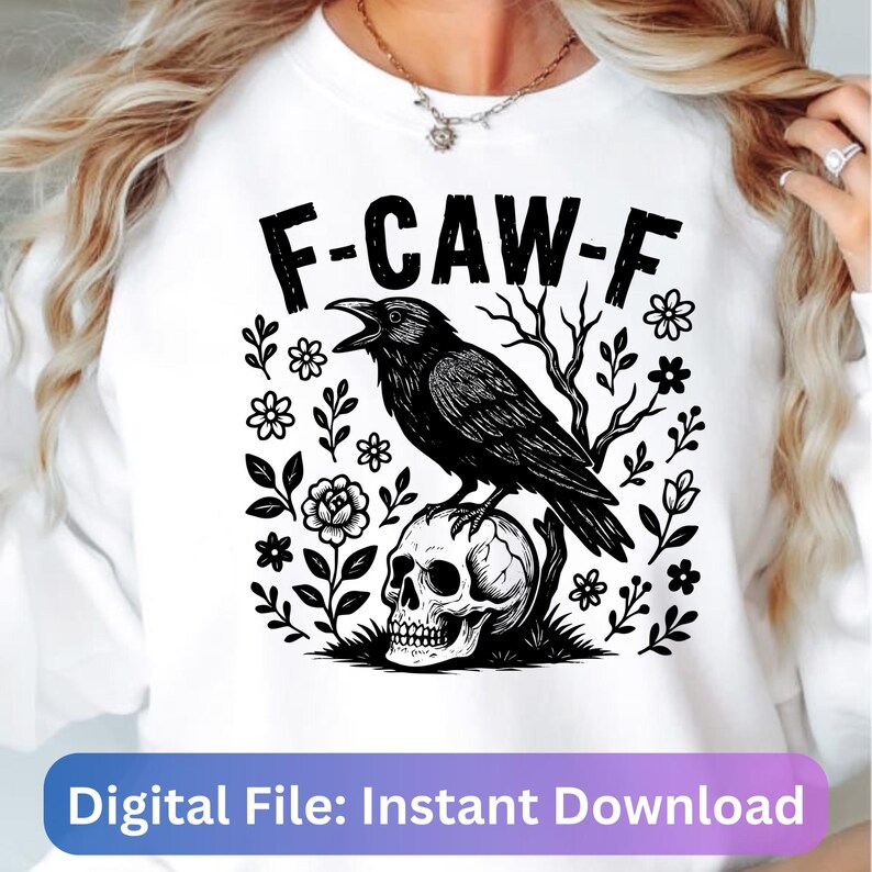 May include: White sweatshirt with a black graphic featuring a crow perched on a skull, surrounded by floral and botanical elements. The text "F-CAW-F" is above the crow. The bottom of the image has the text "Digital File: Instant Download".