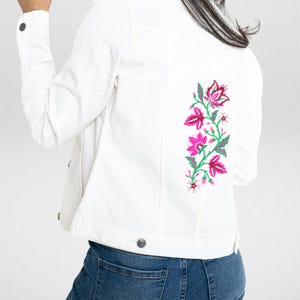 White denim jacket for women with embroidered back.