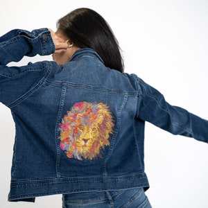 Women&#39;s embroidered denim fitted jacket, flowers and lion design.