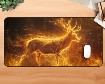 May include: A black and gold mousepad with a fiery deer design. The deer is outlined in gold and has a glowing effect.