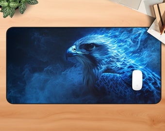 May include: A blue and black mousepad with a detailed image of a hawk with blue flames behind it.