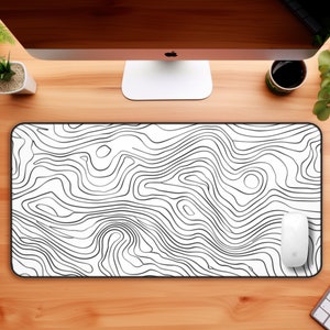 Topografische kaartlijntekeningen in een bureaumat in vectorgrafische ontwerpstijl