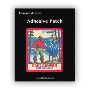 May include: Adhesive patch featuring Paul Bunyan and Babe the Blue Ox. The patch has a red border and depicts a lumberjack with a blue ox in a forest scene. The text "PAUL BUNYAN" and "BABE THE BLUE OX" are displayed on the patch.