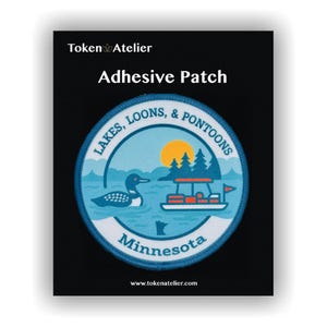 May include: Adhesive patch with a circular design featuring a lake scene with a loon, pontoon boat, and trees under a yellow sun. The text reads "Lakes, Loons, & Pontoons" and "Minnesota". The patch is on a black background.