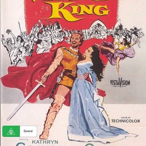 May include: A film poster for the movie "The Vagabond King", starring Kathryn Grayson and Oreste. The poster features a colourful illustration of the actors in period costumes, with a red and yellow colour scheme. The text "VistaVision" and "Color by Technicolor" are also visible on the poster.