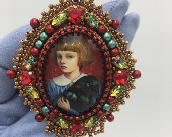 Handcrafted Brooch "Girl with Raven" - Beaded and Glass Cabochon Handwork