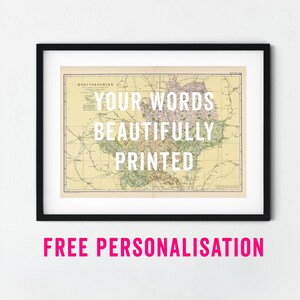 May include: A framed vintage map print of Hertfordshire, England, in a black frame. The map shows roads and towns, with the text "YOUR WORDS BEAUTIFULLY PRINTED". Below the frame, the text "FREE PERSONALISATION" is displayed in pink.