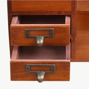 Interior view of small wooden storage drawers