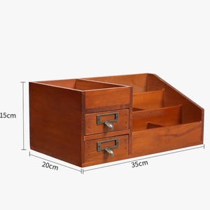 Wooden desk organiser with drawers shown with size measurements