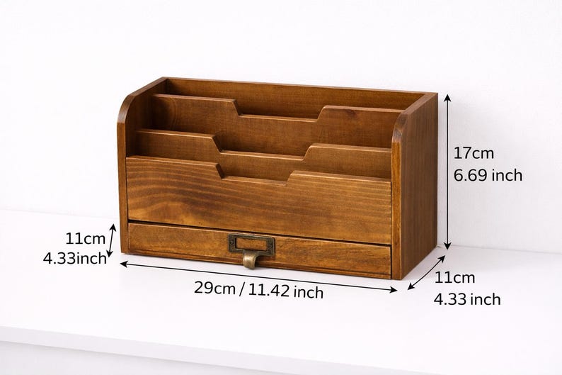 Wooden desk organiser with three compartments and drawer showing size measurements on a white background