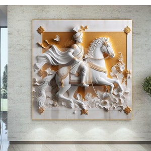 May include: A white 3D wall art sculpture of a person riding a horse. The sculpture is set against a gold background with white flowers and butterflies.