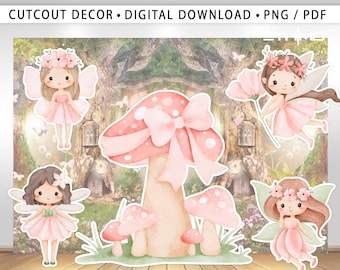 May include: A whimsical fairy-themed cutout decor featuring a large pink mushroom with a bow, surrounded by smaller mushrooms and several fairy figures in pink dresses and flower crowns. The background depicts a forest scene with the text "CUTOUT DECOR • DIGITAL DOWNLOAD • PNG / PDF".