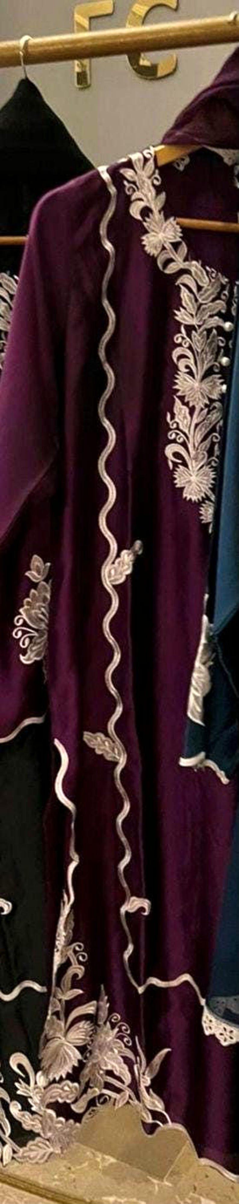 Elegant raw silk embroidered suit designed for Pakistani formal and party wear. Perfect festive and wedding outfit with fine embroidery and premium fabric, making it an ideal Pakistani formal suit or stylish party wear for women seeking timeless traditional elegance