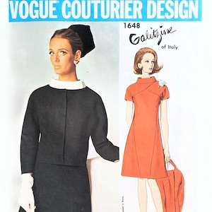 May include: Vintage Vogue Couturier Design sewing pattern featuring two women's fashion illustrations. One model wears a black dress with a white collar and matching jacket. The other model is in an orange dress. The pattern is labeled "1648 Galitzine of Italy."