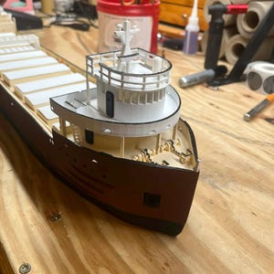 unpainted and unbuilt ,HO scale Great Lakes ore carrier. Unassembled and unpainted.  EZ to put together, build to order