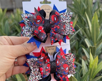 Two Spider Pigtail Bows