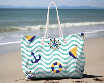 May include: A white tote bag with a nautical theme. The bag features a blue anchor, a yellow sailboat, a blue and yellow life preserver, and a blue and yellow ship's wheel on a turquoise and white wave pattern.