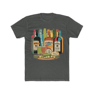 May include: A dark green t-shirt featuring a graphic of five bottles of liquor and a shot glass with a pickle garnish. The bottles are labelled "The Notery", "Pickkles", "Pickklo", and "Jack Firenze".