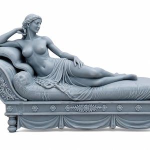 May include: A grey monochromatic sculpture of a reclining figure resting on a chaise longue. The figure is draped in fabric, with one arm raised behind the head. The base features carved floral details and a draped fabric effect along the bottom.