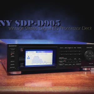 May include: A black Sony SDP-D905 vintage stereo digital EQ processor deck. The unit has a display screen showing a spectrum analyzer. The text "SONY SDP-D905 Vintage Stereo Digital EQ Processor Deck" is displayed above the unit.