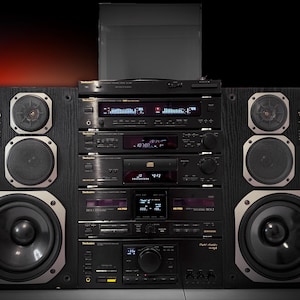 May include: A vintage Technics stereo system with black components and wooden speaker cabinets. The system includes a turntable, CD player, cassette deck, tuner, and amplifier. The speakers have silver trim and multiple drivers.