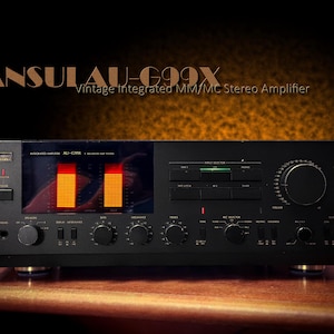 May include: Black Sansui AU-G99X vintage integrated stereo amplifier. The face of the amplifier has multiple knobs, buttons, and a display showing orange bars. The text "SANSUI AU-G99X Vintage Integrated MM/MC Stereo Amplifier" is displayed.