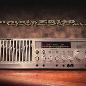 May include: Silver Marantz EQ140 vintage stereo graphic equalizer with multiple sliders, knobs, and buttons. The text "Marantz EQ140 Vintage Stereo Graphic Equalizer | Chorus | Echo Effect | Audio Mixer" is displayed at the top.