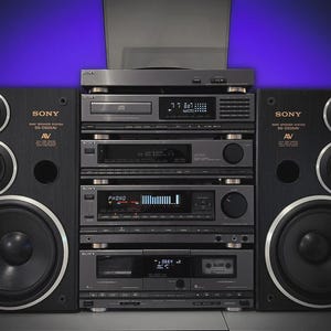 May include: A vintage Sony stereo system with black speakers and a central unit. The system includes a turntable, CD player, tuner, amplifier, and cassette deck. The speakers have silver trim around the speakers.