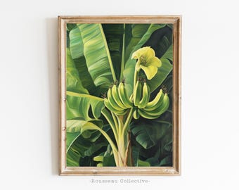 May include: A painting of a banana tree with green leaves and a bunch of green bananas. The banana tree is in a wooden frame.
