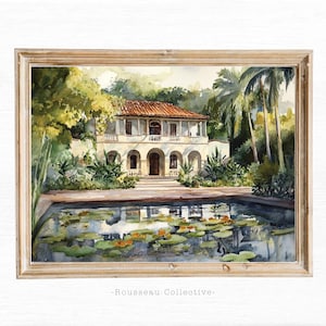 Op de afbeelding: Een aquarel van een wit gebouw met een rood pannendak, omringd door weelderige groene bomen en een reflecterende vijver met waterlelies. Het schilderij is ingelijst in een licht houten lijst.