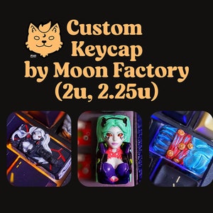 May include: Three custom keycaps featuring anime-inspired designs. The keycaps are made of resin and feature intricate details. The keycaps are labelled "Custom Keycap by Moon Factory (2u, 2.25u)".