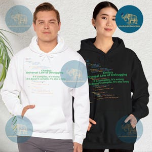 May include: Two white and black hoodies with a humorous programming quote about debugging. The white hoodie has the text "Charlie's Universal Law of Debugging: If it compiles, it's wrong. If it doesn't compile, it's also wrong." The black hoodie has the text "Emily's Universal Law of Debugging: If it compiles, it's wrong. If it doesn't compile, it's also wrong."