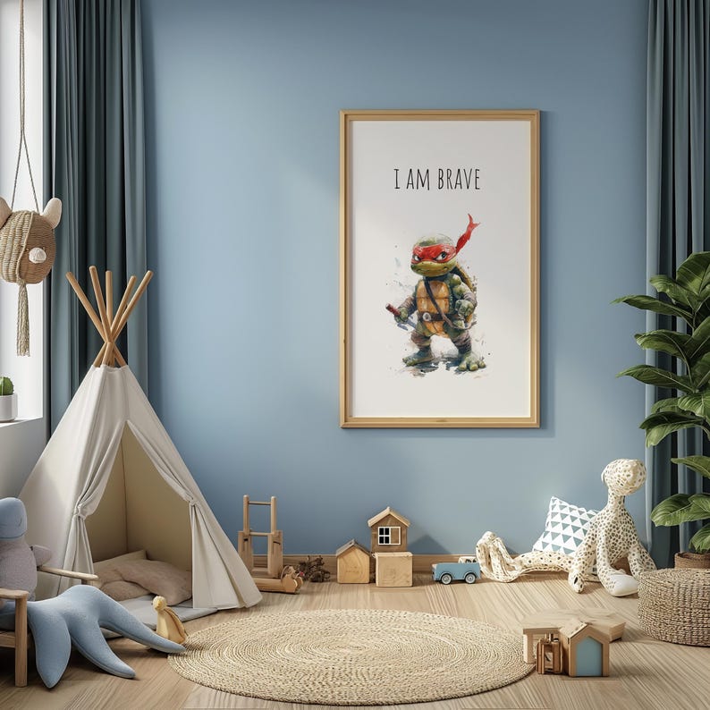 May include: A watercolor painting of a Teenage Mutant Ninja Turtle with a red bandana and the words "I AM BRAVE" printed above the turtle. The painting is framed and hanging on a light blue wall in a child's room.