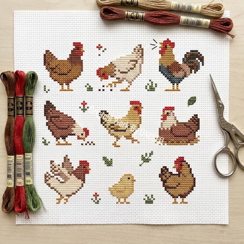 May include: A completed cross-stitch project featuring various chickens and a rooster in shades of brown, tan, and red. The design includes small green accents and is surrounded by embroidery floss and scissors. The theme is farm animals.