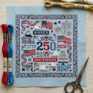 May include: A set of three ceramic mugs with a speckled, matte finish. The mugs are in shades of cream, light gray, and dark gray. Each mug has a simple, minimalist design and a rounded handle. Perfect for coffee or tea.