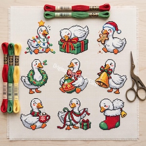 May include: A cross-stitch pattern on white fabric featuring nine distinct white duck illustrations with Christmas themes, including ducks with lights, gifts, a wreath, a bell, and a stocking, accompanied by six colorful embroidery floss skeins and scissors.